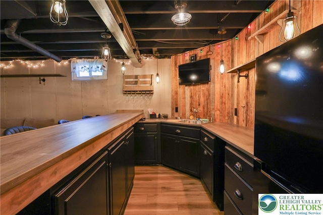 4691 Hampshire Dr, Hanover Twp, PA 18017 - bar area with light wood finished floors and freestanding refrigerator