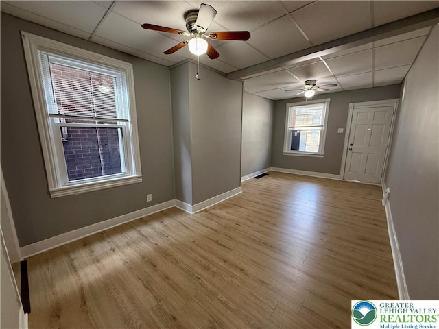 115 W Frankford St, Bethlehem City, PA 18018 - empty room with ceiling fan, a paneled ceiling, and light wood finished floors