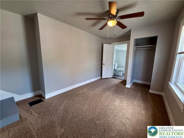 115 W Frankford St, Bethlehem City, PA 18018 - unfurnished bedroom featuring carpet, a closet, a textured ceiling, and ceiling fan