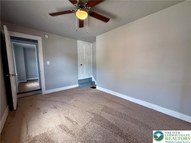 115 W Frankford St, Bethlehem City, PA 18018 - unfurnished bedroom with carpet, a textured ceiling, and a ceiling fan