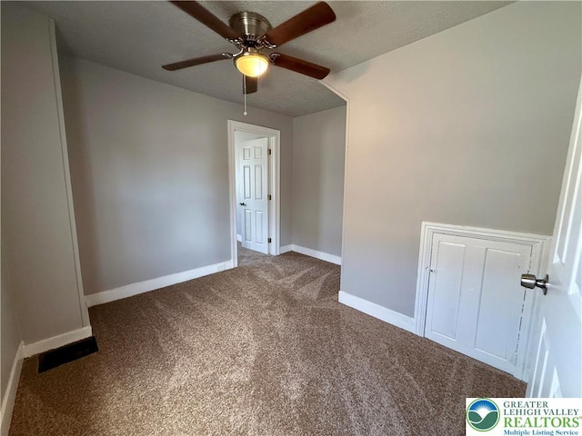 115 W Frankford St, Bethlehem City, PA 18018 - empty room with carpet floors and a ceiling fan