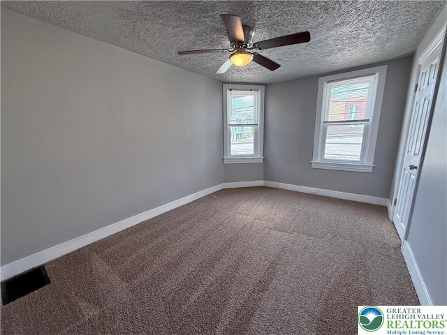 115 W Frankford St, Bethlehem City, PA 18018 - carpeted spare room featuring a textured ceiling and ceiling fan