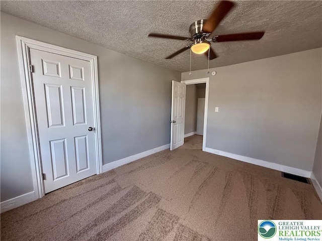 115 W Frankford St, Bethlehem City, PA 18018 - unfurnished bedroom with a textured ceiling, carpet flooring, and a ceiling fan