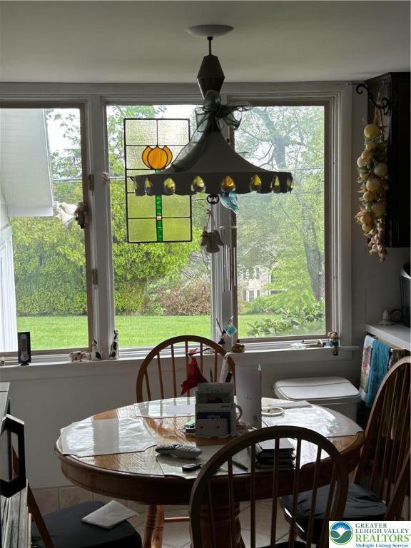4941 Glenview St, North Whitehall Twp, PA 18078 - dining space with healthy amount of natural light and ceiling fan