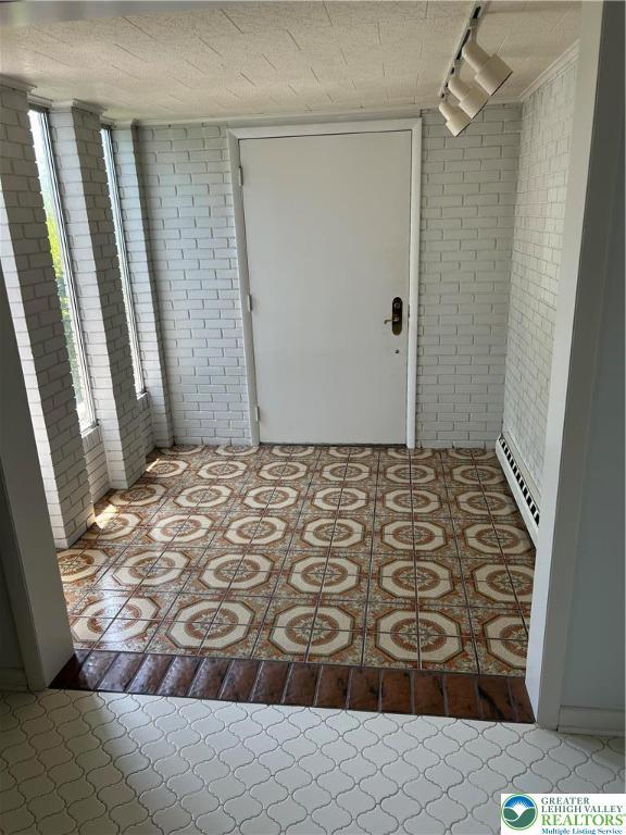 4941 Glenview St, North Whitehall Twp, PA 18078 - property entrance with a baseboard heating unit
