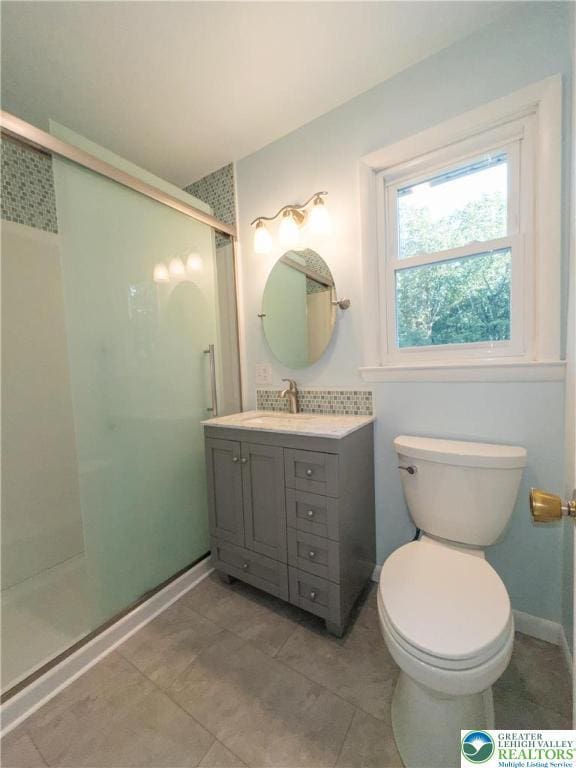 4015 Sycamore Dr, Lehigh Twp, PA 18067 - bathroom featuring a shower stall, vanity, and tile patterned flooring