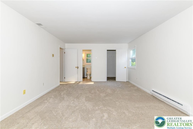 4015 Sycamore Dr, Lehigh Twp, PA 18067 - unfurnished bedroom featuring baseboard heating, carpet floors, ensuite bathroom, and a closet