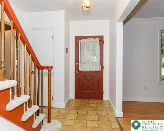 4015 Sycamore Dr, Lehigh Twp, PA 18067 - foyer featuring stairway and light stone finish floors