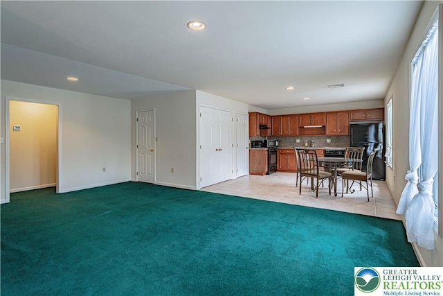 26 Chestnut Commons Ct, Easton, PA 18040 - living room with light carpet, recessed lighting, and light tile patterned flooring