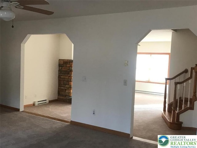 217 St Andrews Dr, Middle Smithfield Twp, PA 18324 - empty room with a ceiling fan, carpet, and arched walkways