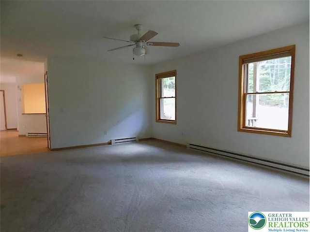 217 St Andrews Dr, Middle Smithfield Twp, PA 18324 - spare room with plenty of natural light, baseboard heating, light colored carpet, and ceiling fan