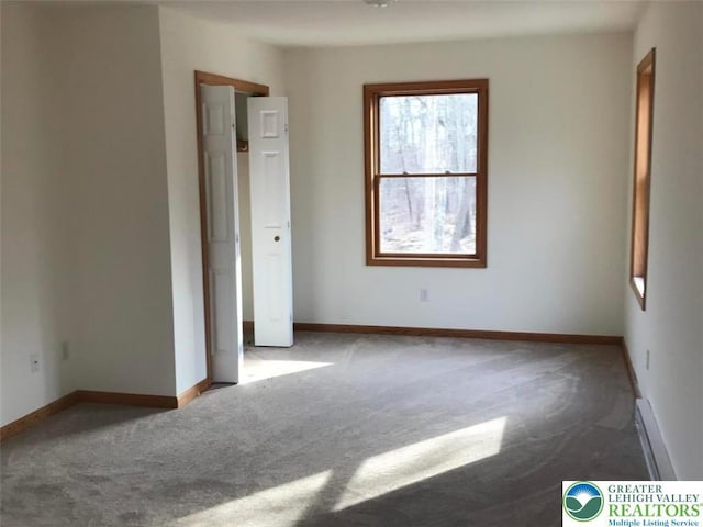217 St Andrews Dr, Middle Smithfield Twp, PA 18324 - carpeted empty room with baseboards
