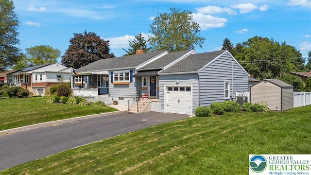 320 Nulton Ave, Palmer Twp, PA 18045 - view of front of house with a garage, a chimney, a front lawn, and asphalt driveway
