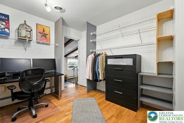 320 Nulton Ave, Palmer Twp, PA 18045 - office space with wood finished floors, baseboard heating, and a baseboard radiator