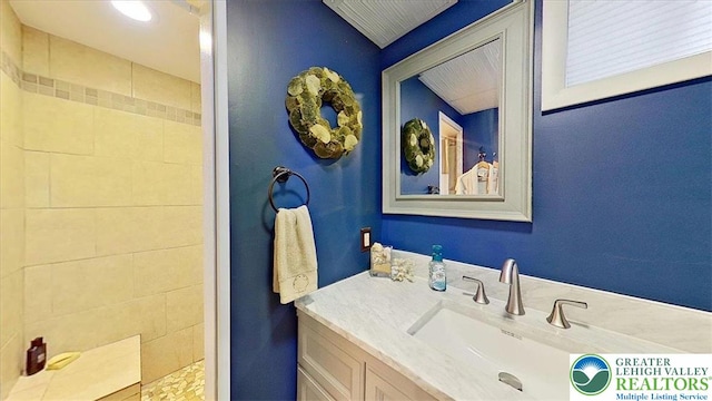 320 Nulton Ave, Palmer Twp, PA 18045 - bathroom featuring tiled shower and vanity