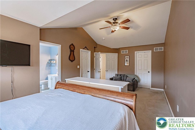 301 Maple Ct, Alburtis Boro, PA 18011 - bedroom featuring light colored carpet, vaulted ceiling, connected bathroom, and a ceiling fan