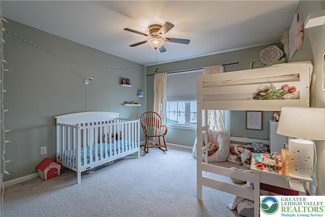 301 Maple Ct, Alburtis Boro, PA 18011 - carpeted bedroom featuring a nursery area and ceiling fan