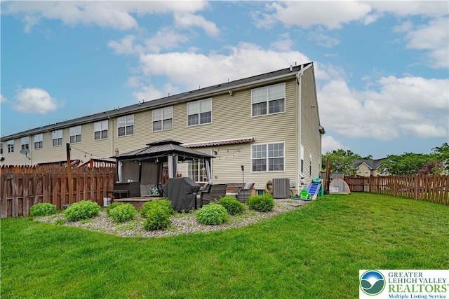 301 Maple Ct, Alburtis Boro, PA 18011 - back of property featuring a gazebo, a fenced backyard, an outdoor living space, and a patio area