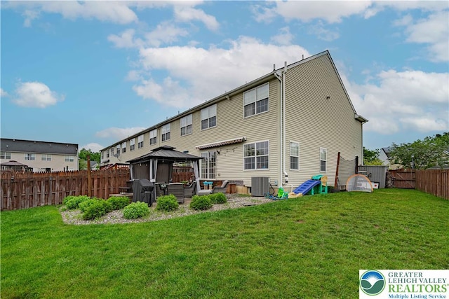 301 Maple Ct, Alburtis Boro, PA 18011 - rear view of property with a gazebo, a fenced backyard, and a patio