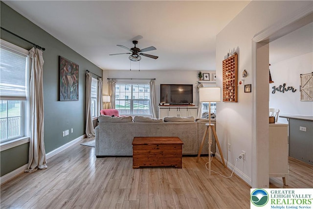 301 Maple Ct, Alburtis Boro, PA 18011 - living room with ceiling fan and light wood-style floors
