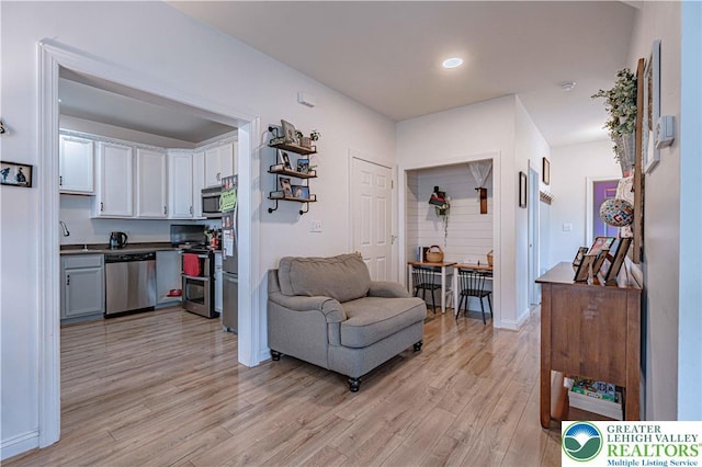 301 Maple Ct, Alburtis Boro, PA 18011 - living room featuring light wood-style floors and recessed lighting