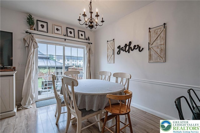 301 Maple Ct, Alburtis Boro, PA 18011 - dining space featuring a chandelier and light wood finished floors