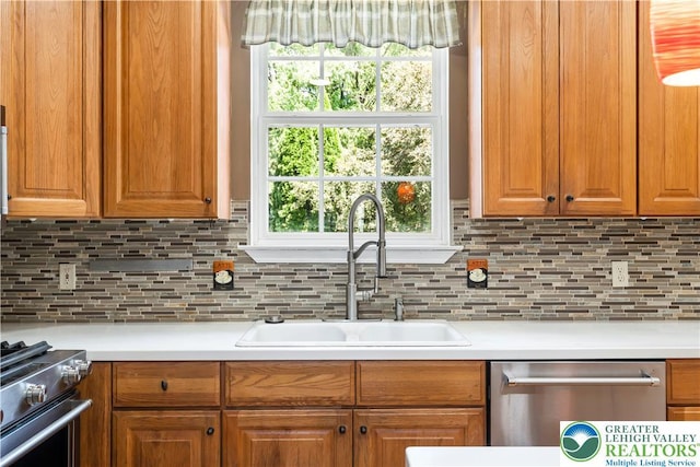 2535 Clark Pl, Forks Twp, PA 18040 - kitchen featuring stainless steel appliances, light countertops, and backsplash