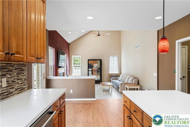 2535 Clark Pl, Forks Twp, PA 18040 - kitchen with decorative backsplash, light countertops, a ceiling fan, brown cabinets, and recessed lighting