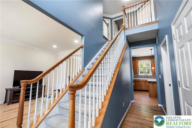 2535 Clark Pl, Forks Twp, PA 18040 - staircase featuring wood finished floors, crown molding, and recessed lighting