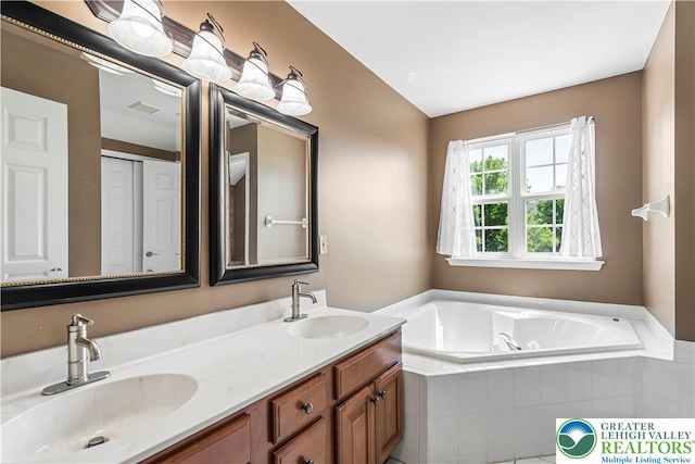 2535 Clark Pl, Forks Twp, PA 18040 - bathroom with double vanity, a garden tub, and vaulted ceiling