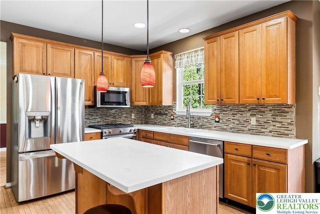 2535 Clark Pl, Forks Twp, PA 18040 - kitchen featuring stainless steel appliances, light wood-type flooring, light countertops, pendant lighting, and recessed lighting
