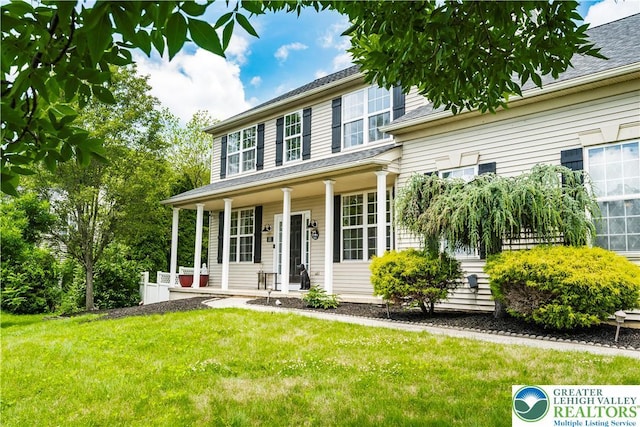 2535 Clark Pl, Forks Twp, PA 18040 - colonial home with a porch and a front yard