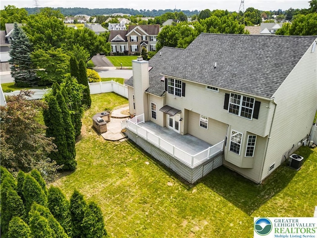 2535 Clark Pl, Forks Twp, PA 18040 - back of property featuring a fenced backyard, a residential view, a chimney, and roof with shingles
