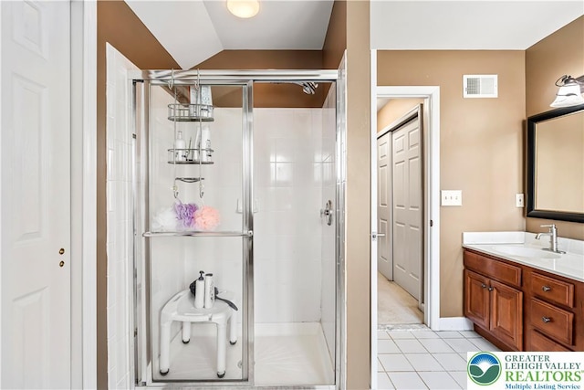 2535 Clark Pl, Forks Twp, PA 18040 - bathroom with tile patterned floors, a stall shower, vanity, and vaulted ceiling