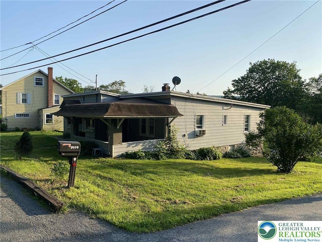 1027 Clamtown Rd, West Penn Twp, PA 18252 - view of front facade featuring a front yard and cooling unit