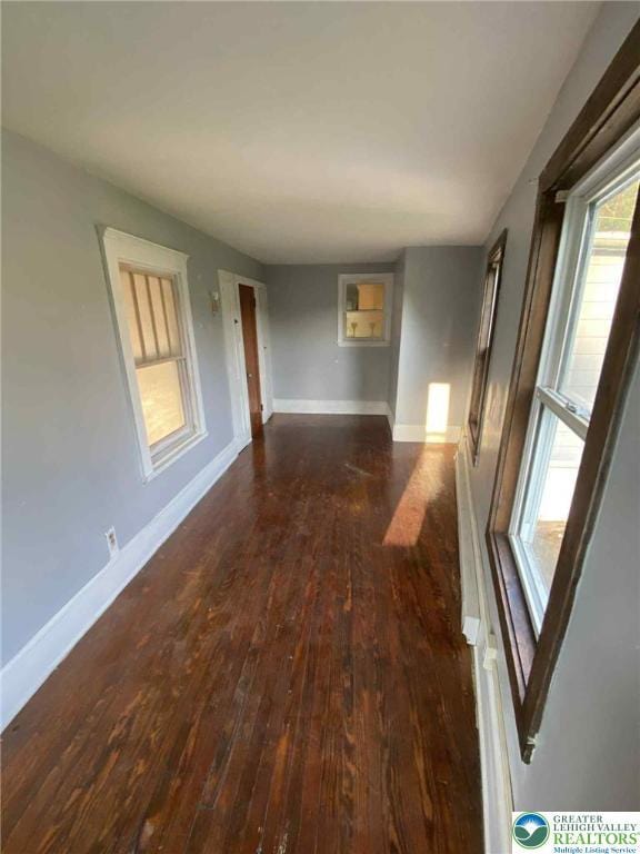 1027 Clamtown Rd, West Penn Twp, PA 18252 - unfurnished room with dark wood-type flooring and baseboards