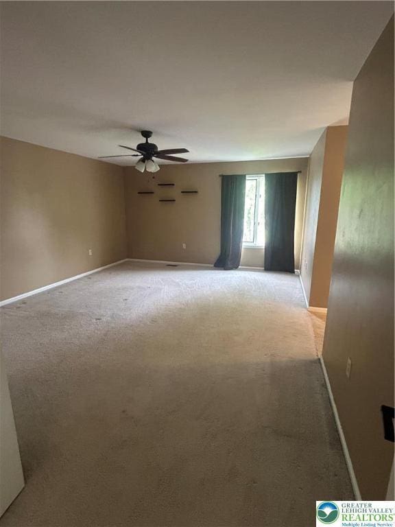 349 Tamarack Dr, South Whitehall Twp, PA 18104 - empty room featuring light colored carpet and a ceiling fan