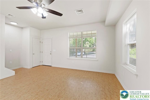 271 W Fairview St W, Bethlehem City, PA 18018 - empty room featuring plenty of natural light, light wood-style floors, and a ceiling fan