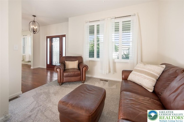 2186 Eagles Landing Dr, Upper Nazareth Twp, PA 18064 - living room featuring carpet and a chandelier