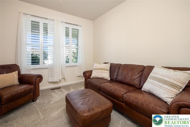 2186 Eagles Landing Dr, Upper Nazareth Twp, PA 18064 - living room featuring carpet flooring and vaulted ceiling