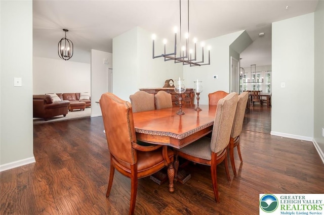 2186 Eagles Landing Dr, Upper Nazareth Twp, PA 18064 - dining space with a chandelier and dark wood-style flooring