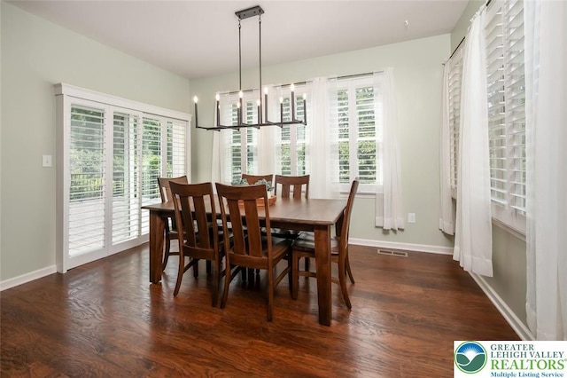 2186 Eagles Landing Dr, Upper Nazareth Twp, PA 18064 - dining room with dark wood finished floors and a chandelier