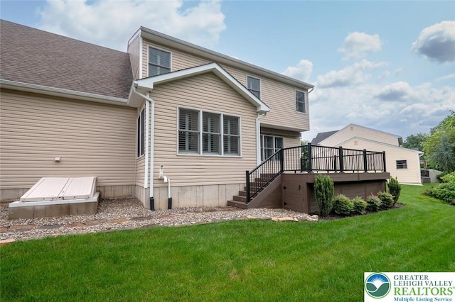 2186 Eagles Landing Dr, Upper Nazareth Twp, PA 18064 - back of property featuring a wooden deck, stairs, a lawn, and roof with shingles