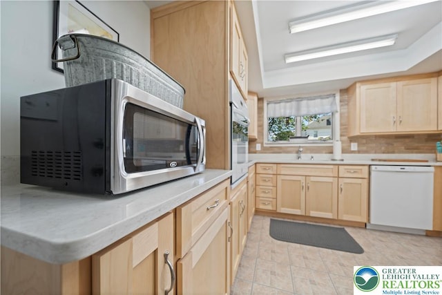 275 E Thomas Ave, Hellertown Boro, PA 18055 - kitchen with white appliances, light brown cabinetry, tasteful backsplash, light countertops, and light tile patterned floors