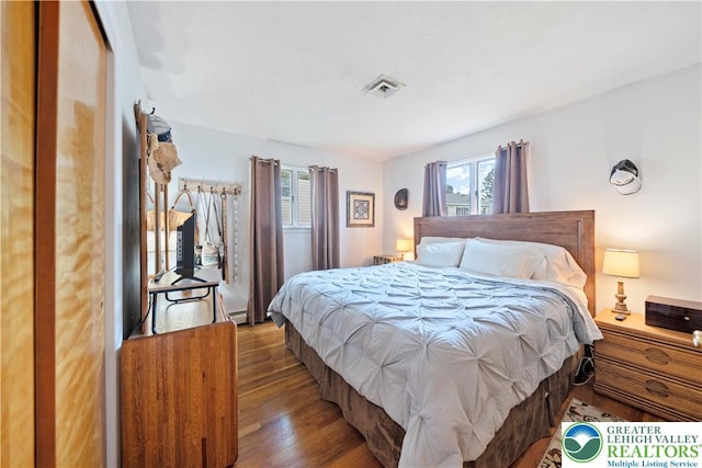 275 E Thomas Ave, Hellertown Boro, PA 18055 - bedroom with wood finished floors and baseboard heating