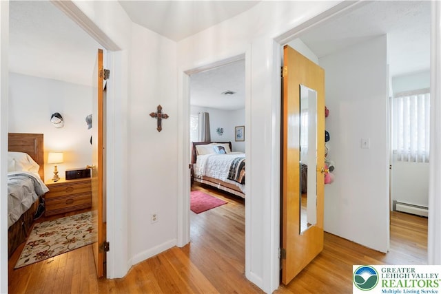 275 E Thomas Ave, Hellertown Boro, PA 18055 - hall featuring a baseboard radiator and light wood-type flooring
