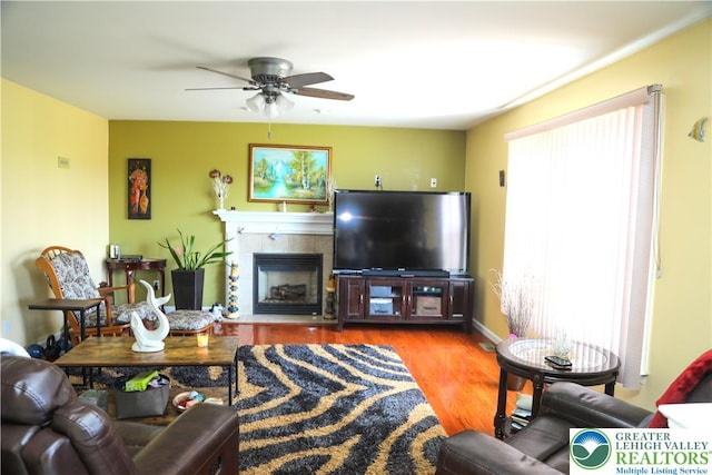 3104 Peacock Dr, Bethlehem Twp, PA 18020 - living room with a ceiling fan, wood finished floors, and a tile fireplace
