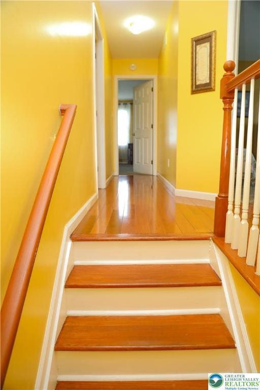 3104 Peacock Dr, Bethlehem Twp, PA 18020 - stairway featuring baseboards and wood finished floors