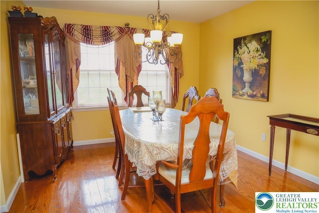3104 Peacock Dr, Bethlehem Twp, PA 18020 - dining space featuring a chandelier and wood finished floors