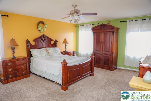 3104 Peacock Dr, Bethlehem Twp, PA 18020 - bedroom featuring multiple windows, light carpet, and ceiling fan